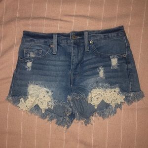 Ripped lacy jean shorts